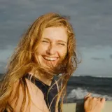 A smiling blond woman